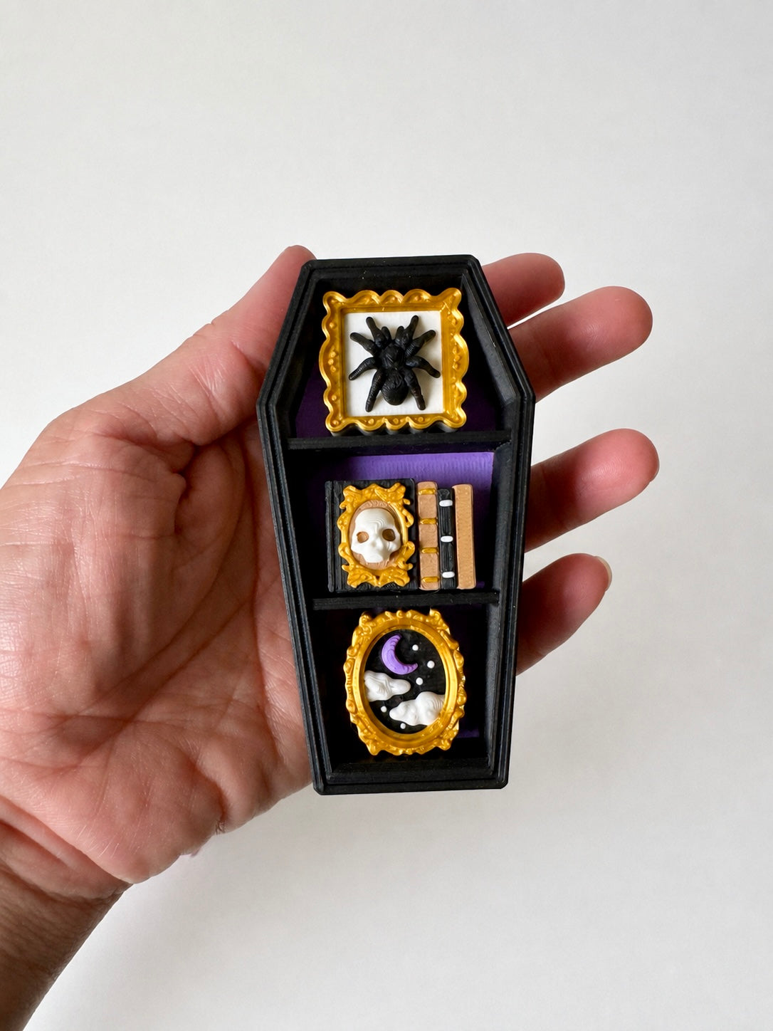 Coffin Bookcase Clicker