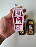 Coffin Bookcase Clicker