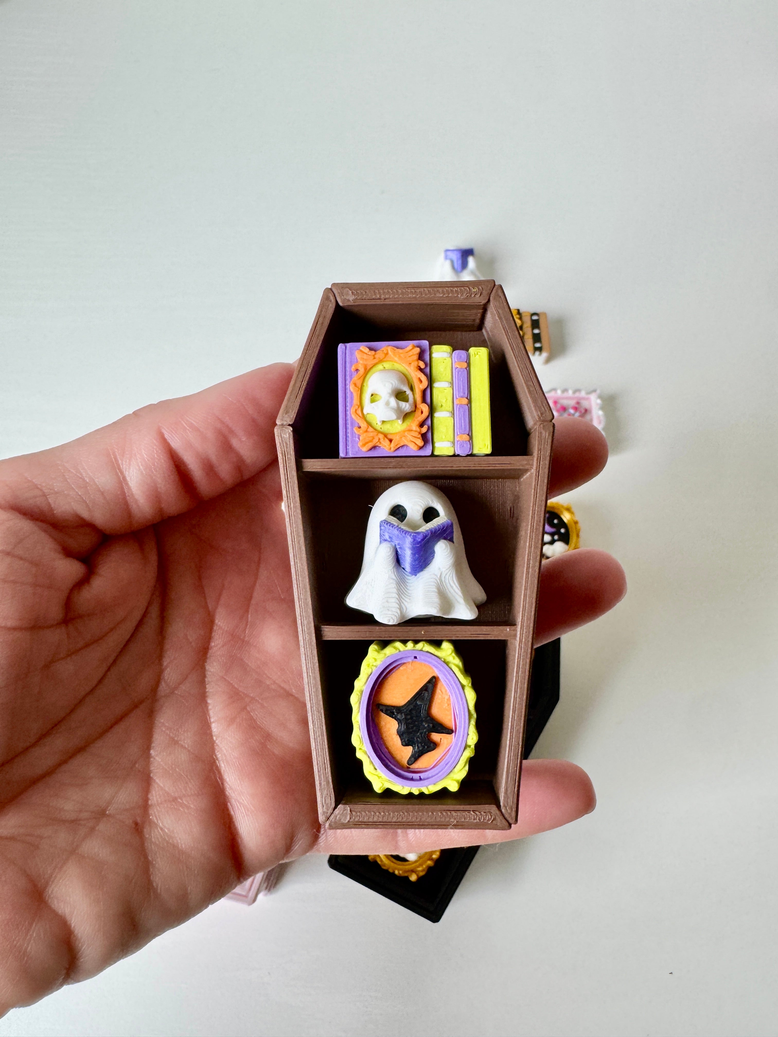 Coffin Bookcase Clicker