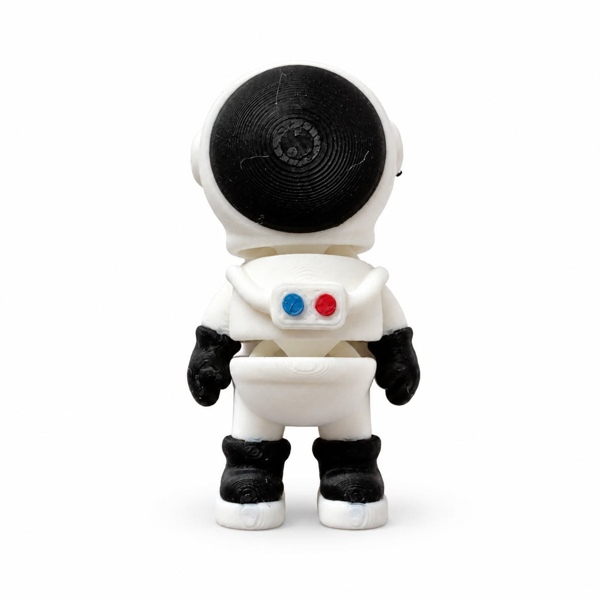 Mini Flexi Astronaut in white suit with black visor and blue and red chest buttons