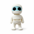 Mini Flexi Mummy with white bandages, light blue face and black eyes