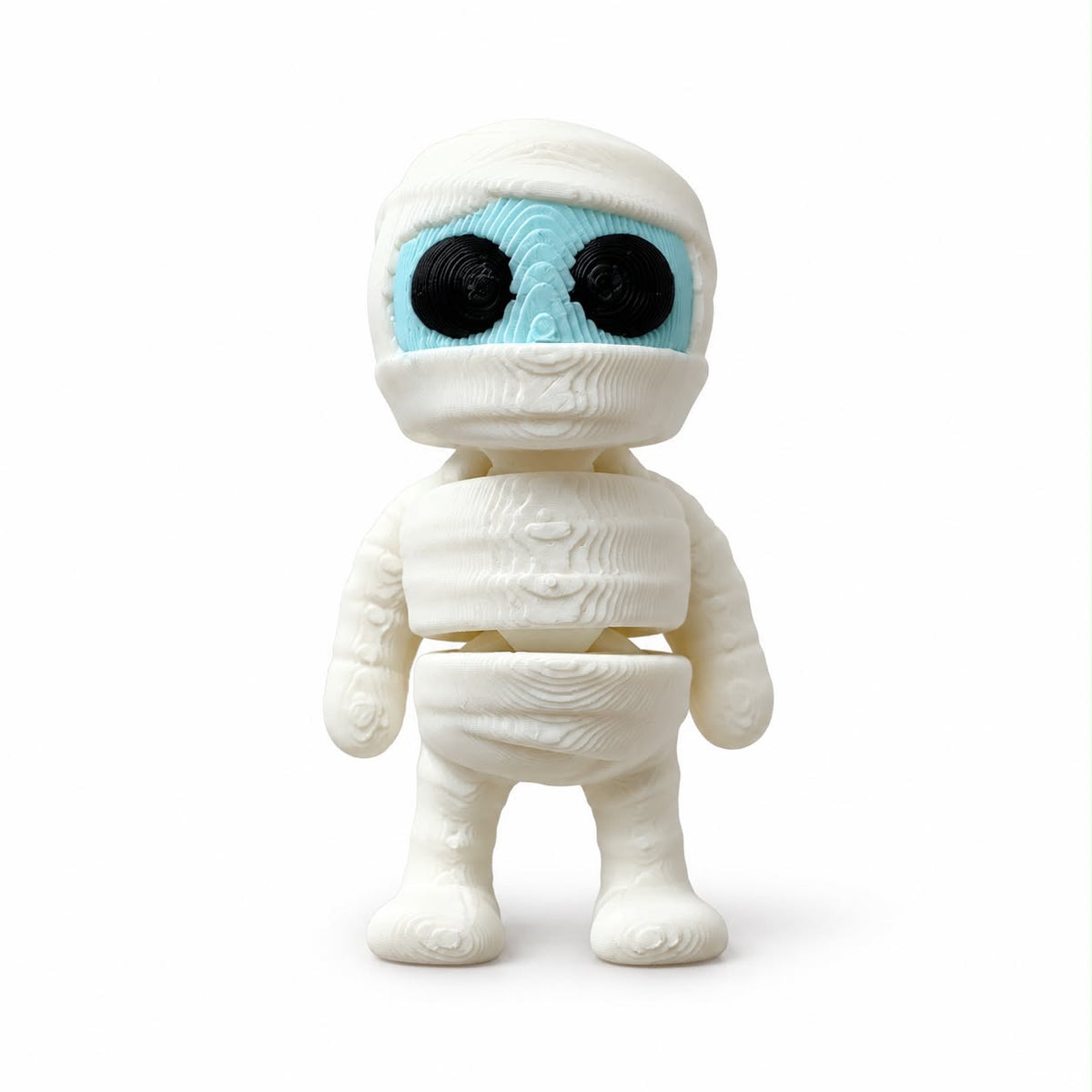 Mini Flexi Mummy with white bandages, light blue face and black eyes